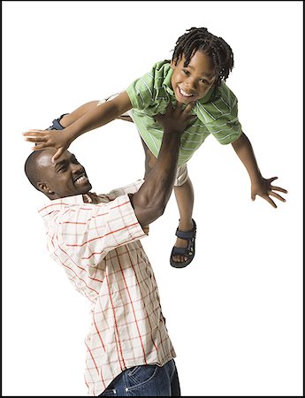 Father playing with young son Stock Photo - Premium Royalty-Free, Code: 640-01356713