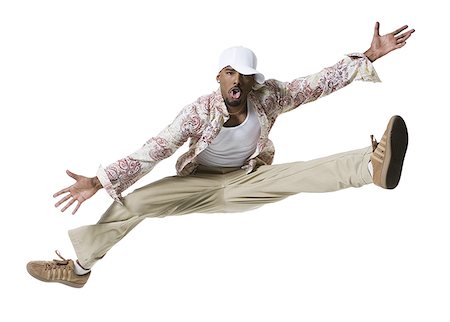 simsearch:640-03265333,k - African American man jumping Stock Photo - Premium Royalty-Free, Code: 640-01356813