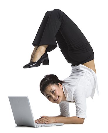 Female contortionist businesswoman Foto de stock - Sin royalties Premium, Código: 640-01356820