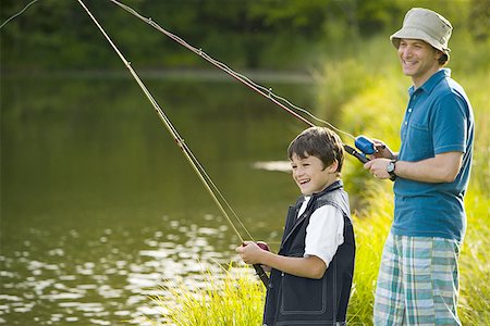 photos of little boy fishing - Profile of a man and his son fishing Foto de stock - Sin royalties Premium, Código: 640-01356833