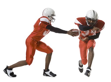 pigskin - Two American football players Stock Photo - Premium Royalty-Free, Code: 640-01357410
