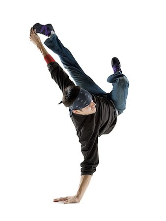 Young man break dancing Stock Photo - Premium Royalty-Free, Code: 640-01357517