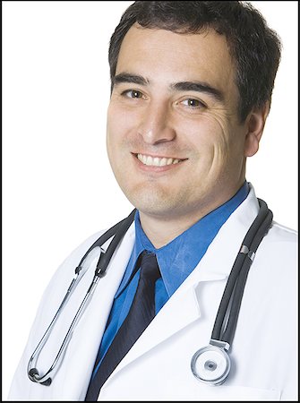 face front man - Portrait of a male doctor smiling Foto de stock - Sin royalties Premium, Código: 640-01358241