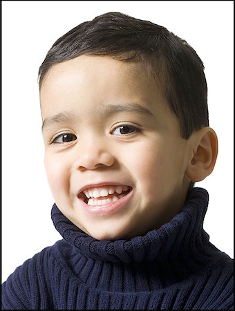 Portrait of a boy smiling Stock Photo - Premium Royalty-Free, Code: 640-01358626