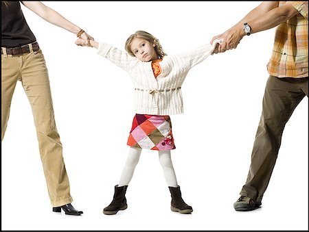 Unhappy young girl in custody battle Stock Photo - Premium Royalty-Free, Code: 640-01358690