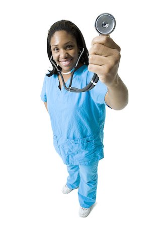 simsearch:640-01364042,k - Portrait of a female nurse holding a stethoscope Stock Photo - Premium Royalty-Free, Code: 640-01358816
