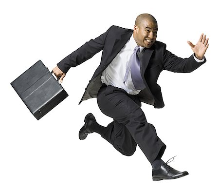 fast business - Businessman running Stock Photo - Premium Royalty-Free, Code: 640-01358845