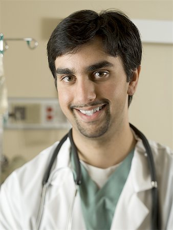 Portrait of a male doctor smiling Stock Photo - Premium Royalty-Free, Code: 640-01358958