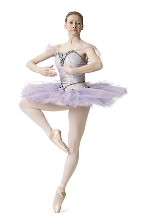 simsearch:640-01351921,k - Portrait of a young ballet dancer standing on her one leg Foto de stock - Sin royalties Premium, Código: 640-01359062