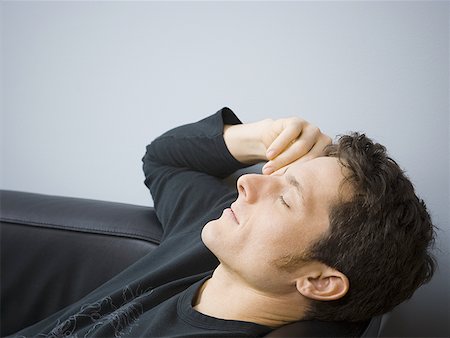 Close-up of an adult man sleeping Stock Photo - Premium Royalty-Free, Code: 640-01359516
