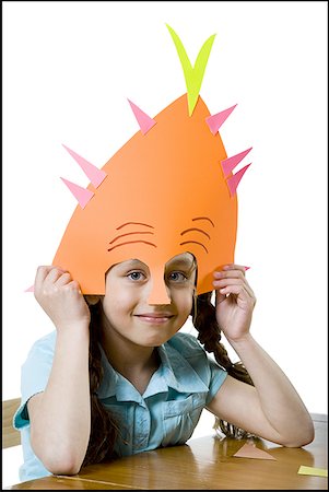 simsearch:640-01357979,k - Portrait of a girl wearing a paper mask Stock Photo - Premium Royalty-Free, Code: 640-01359884