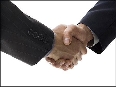 simsearch:640-03262464,k - Two businessmen shaking hands Stock Photo - Premium Royalty-Free, Code: 640-01359987
