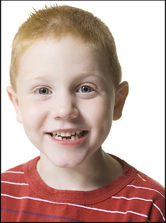 Portrait of a boy smiling Stock Photo - Premium Royalty-Free, Code: 640-01350036