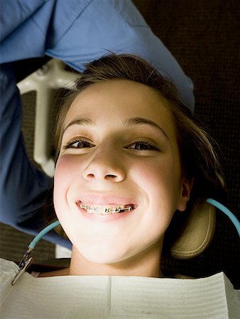 Girl having dental examination Stock Photo - Premium Royalty-Free, Code: 640-01350361