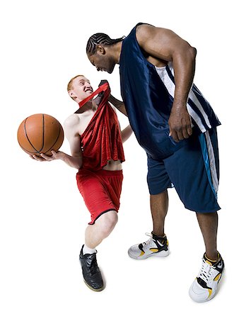 feeble - Affrontement entre deux joueurs de basket-ball Photographie de stock - Premium Libres de Droits, Code: 640-01350631