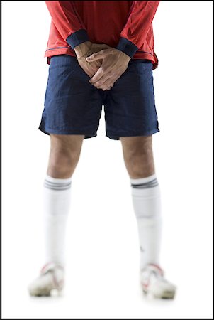 simsearch:640-01361005,k - Low section view of a young man protecting his groin Stock Photo - Premium Royalty-Free, Code: 640-01350643