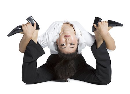 Female contortionist businesswoman Foto de stock - Sin royalties Premium, Código: 640-01350978