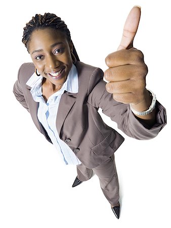 High angle view of a businesswoman showing a thumbs up sign Stock Photo - Premium Royalty-Free, Code: 640-01351008