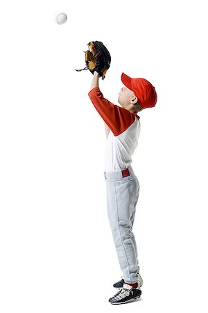 flier - Profile of a baseball player standing in a catching position Stock Photo - Premium Royalty-Free, Code: 640-01351340