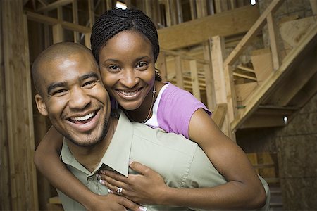 simsearch:640-02764709,k - Portrait of a young adult couple in a house that is under construction Stock Photo - Premium Royalty-Free, Code: 640-01351719