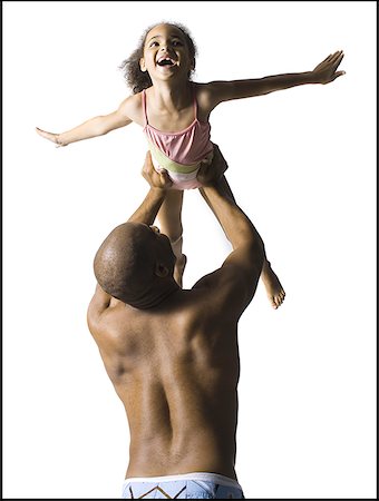 Father playing with young daughter Stock Photo - Premium Royalty-Free, Code: 640-01351730