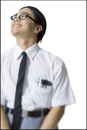 Close-up of a young man smiling Stock Photo - Premium Royalty-Free, Code: 640-01352043