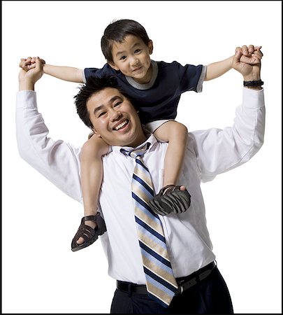 dad carrying teen son - Father and son Stock Photo - Premium Royalty-Free, Code: 640-01352357