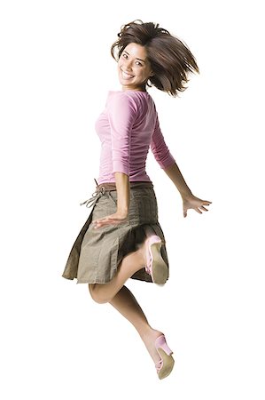 simsearch:640-01601671,k - Woman jumping Stock Photo - Premium Royalty-Free, Code: 640-01352457