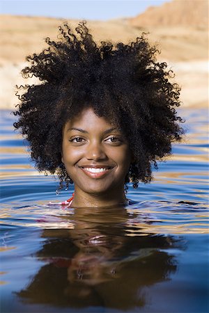 simsearch:640-01358229,k - Portrait of a young woman in a lake Stock Photo - Premium Royalty-Free, Code: 640-01352601