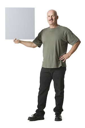 elderly sign - Portrait of a man holding a blank sign Stock Photo - Premium Royalty-Free, Code: 640-01352657