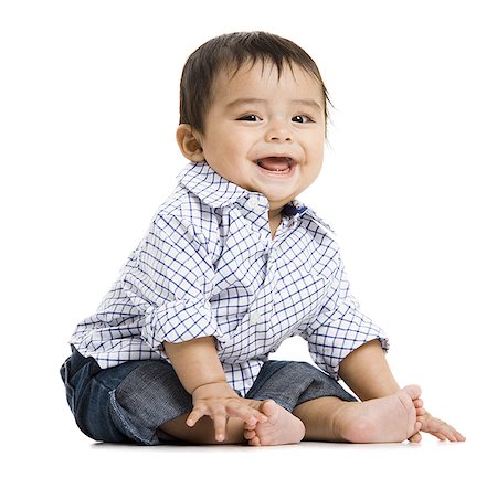 Baby Boy sitting and smiling Stock Photo - Premium Royalty-Free, Code: 640-01352836
