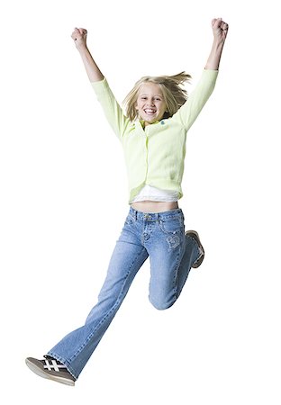 A young girl jumping Stock Photo - Premium Royalty-Free, Code: 640-01352908