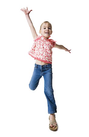 Young girl jumping Stock Photo - Premium Royalty-Free, Code: 640-01352937