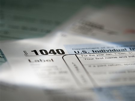 Close-up of a 1040 tax form Stock Photo - Premium Royalty-Free, Code: 640-01352998