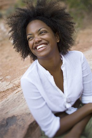 simsearch:640-01358229,k - High angle view of a young woman smiling Stock Photo - Premium Royalty-Free, Code: 640-01353033