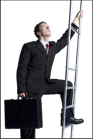 Businessman climbing corporate ladder Stock Photo - Premium Royalty-Free, Code: 640-01353080