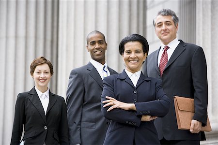 simsearch:640-02767805,k - Portrait of  lawyers smiling in front of a courthouse Stock Photo - Premium Royalty-Free, Code: 640-01353284