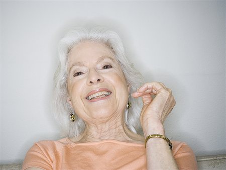 simsearch:640-02768330,k - Portrait of a senior woman smiling Stock Photo - Premium Royalty-Free, Code: 640-01353369