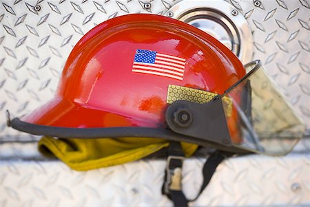 fire truck - Close-up of a firefighter's helmet Stock Photo - Premium Royalty-Free, Code: 640-01353630