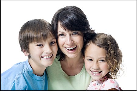 simsearch:640-01354837,k - Portrait of a mid adult woman smiling with her son and daughter Stock Photo - Premium Royalty-Free, Code: 640-01364169