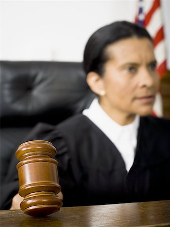 simsearch:640-01350504,k - Female judge holding a gavel Foto de stock - Sin royalties Premium, Código: 640-01364210