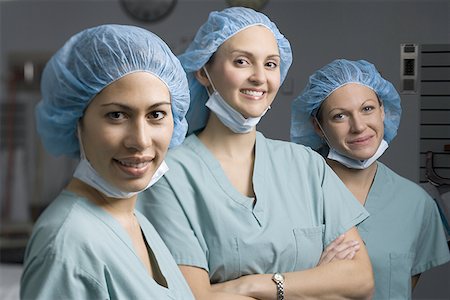 simsearch:640-01364042,k - Portrait of three female surgeon smiling Stock Photo - Premium Royalty-Free, Code: 640-01364676