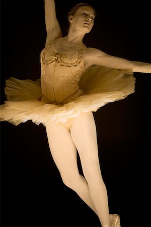 Ballerina in tutu dancing Stock Photo - Premium Royalty-Free, Code: 640-01364715