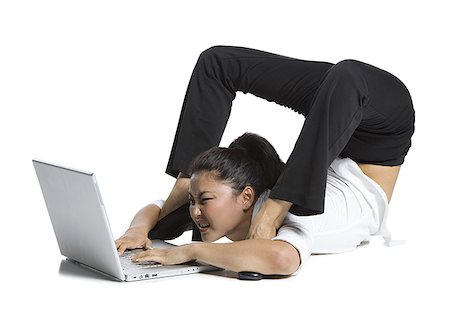 simsearch:640-02768599,k - Female contortionist businesswoman Stock Photo - Premium Royalty-Free, Code: 640-01364718