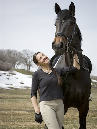 Woman standing with a horse Foto de stock - Sin royalties Premium, Código: 640-01365010