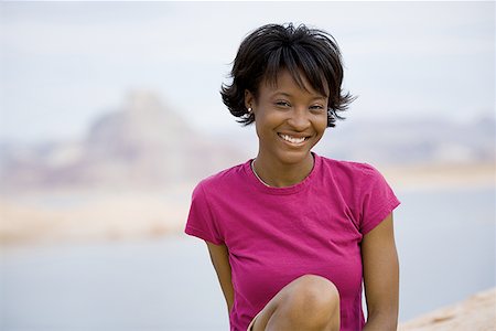 simsearch:640-01358229,k - Close-up of a young woman smiling Stock Photo - Premium Royalty-Free, Code: 640-01365362