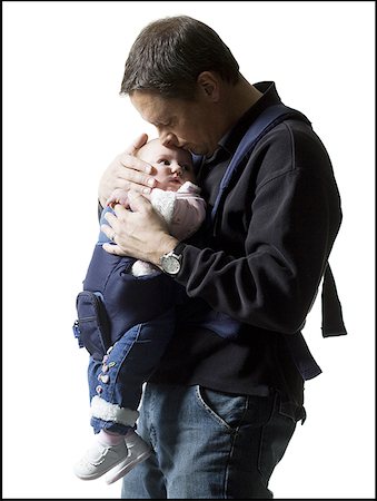 simsearch:640-01354837,k - Close-up of a man carrying his daughter Stock Photo - Premium Royalty-Free, Code: 640-01365473