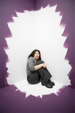 simsearch:640-01357365,k - Portrait of a mid adult woman in the corner of a room Stock Photo - Premium Royalty-Free, Code: 640-01365517