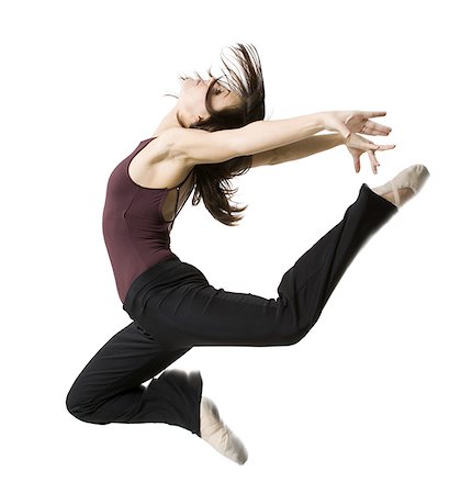 simsearch:640-01351921,k - Side profile of a young woman jumping Foto de stock - Sin royalties Premium, Código: 640-01365636