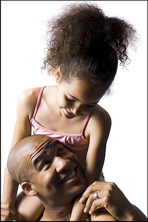 Father holding young daughter Stock Photo - Premium Royalty-Free, Code: 640-01365693